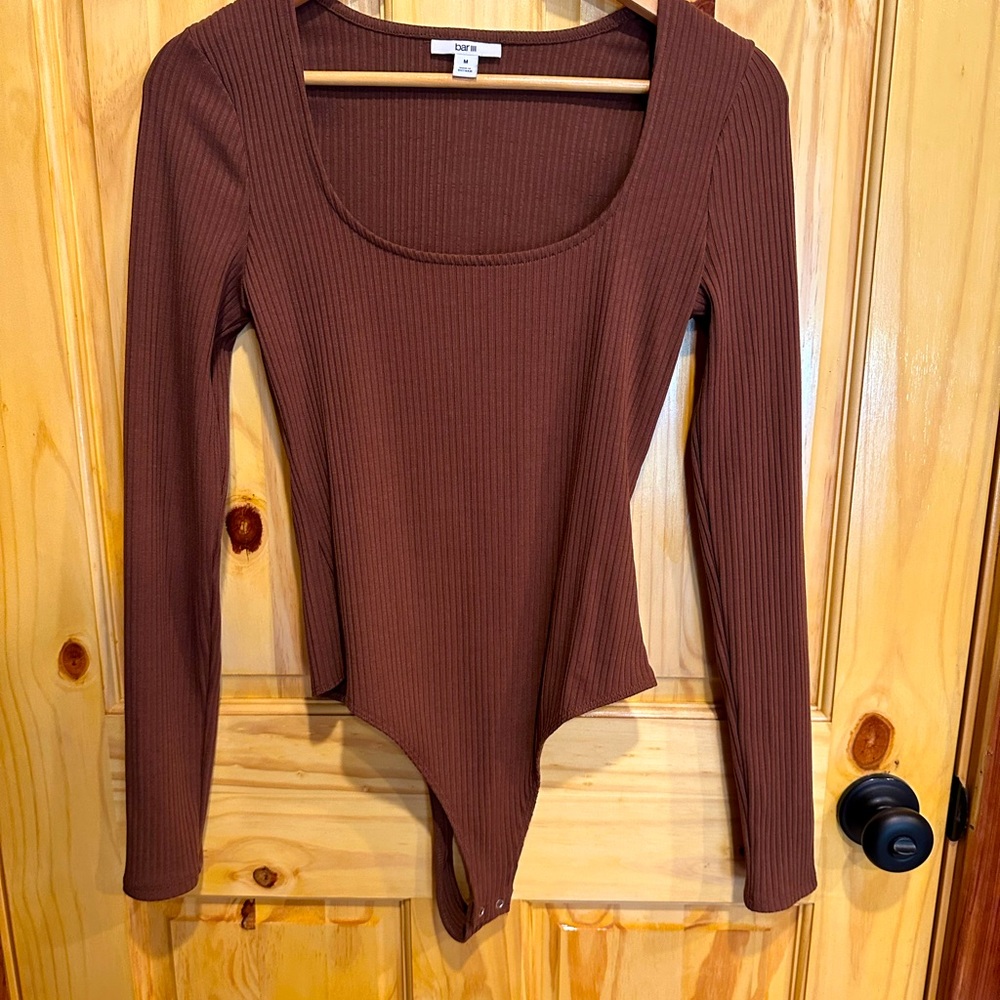 Body suit size med. long sleeve